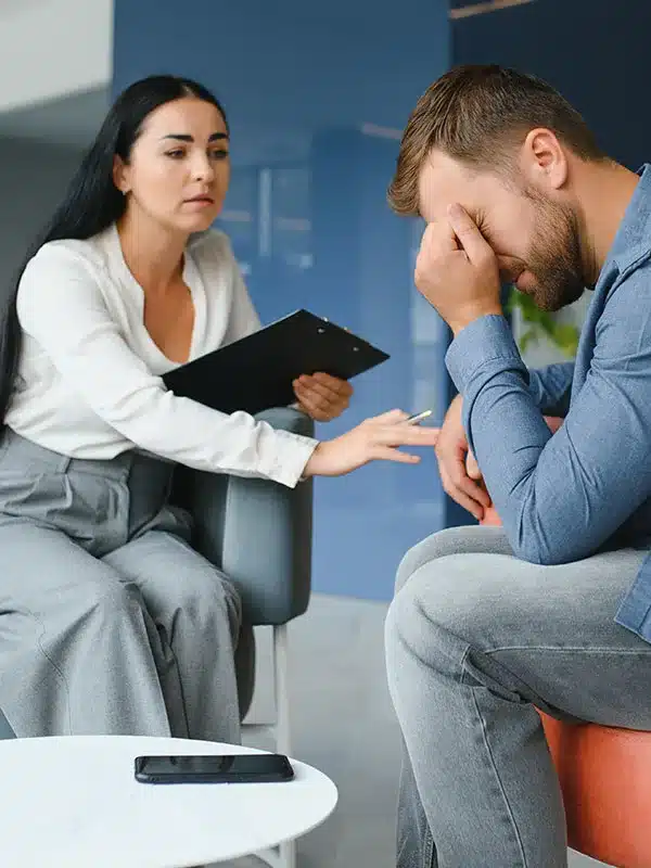 an Upset Man attending therapy
